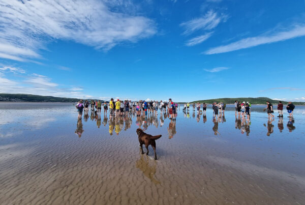 Group of people taking part in the Cross Morecambe Bay Walk